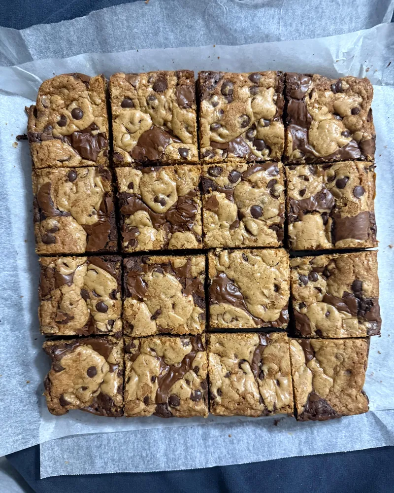 A tray of brookies cut into sixteen squares