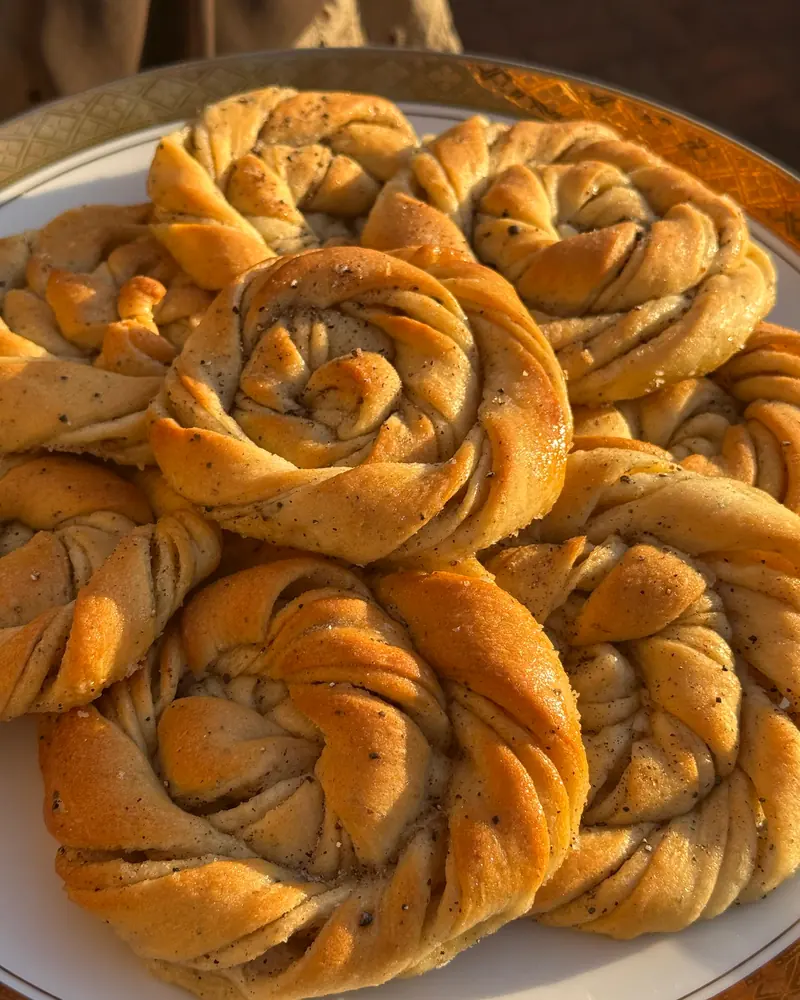 A pile of golden Swedish cardamom buns